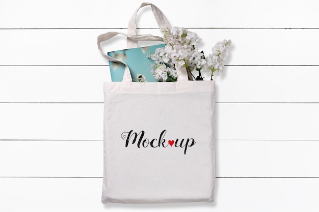 Download White cotton tote bag with flowers and notebook mockup ...
