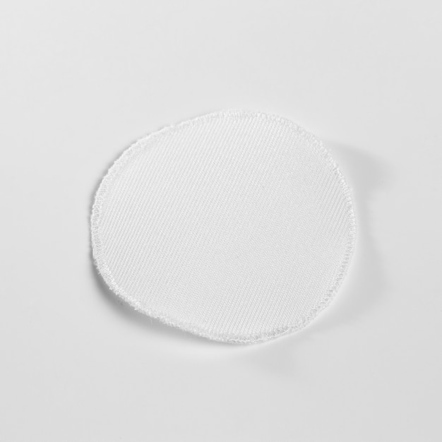 Free PSD | White fabric clothing patch mock-up