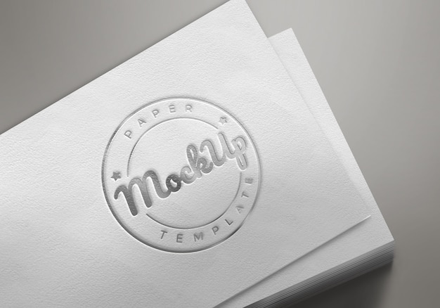 Download White paper with emboss logo mockup | Premium PSD File