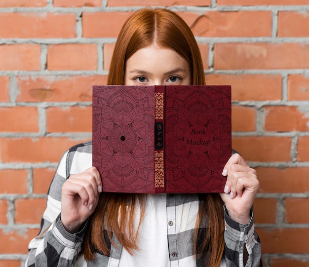 Download Premium Psd Woman Holding Book Mock Up PSD Mockup Templates