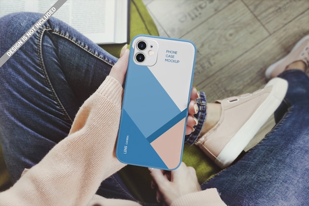 Download Premium PSD | Woman holding smartphone case mockup