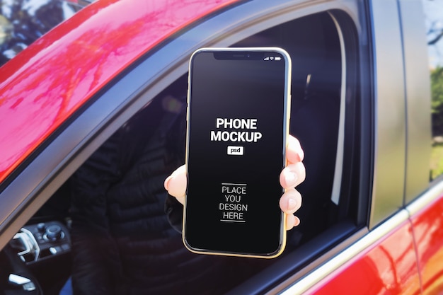 Download Premium PSD | Woman showing smartphone out window car mockup