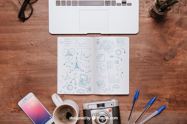 Workspace composition with open booklet PSD Template