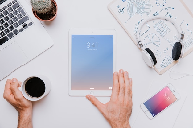 Workspace concept with tablet in middle PSD Template
