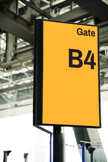 Download Yellow gate signboard mockup at the airport PSD file | Free Download