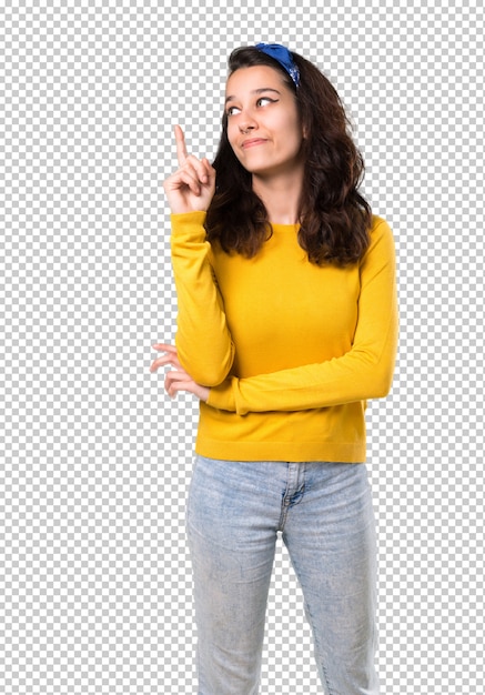 Download Premium PSD | Young girl with yellow sweater and blue ...