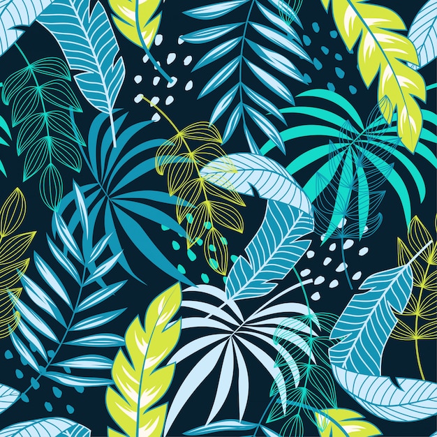 Abstract tropical seamless pattern with blue and green flowers and plants Premium Vector