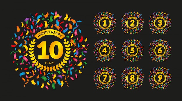 Anniversary badges set with colorful confetti Premium Vector