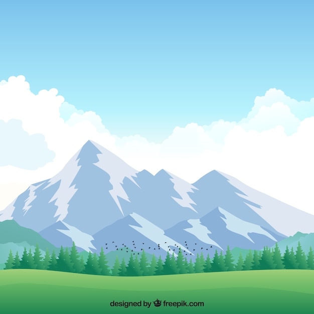 Background of meadow with snowy\
mountains