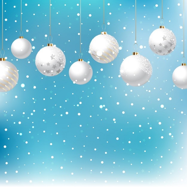 Background with snow and hanging christmas\
balls