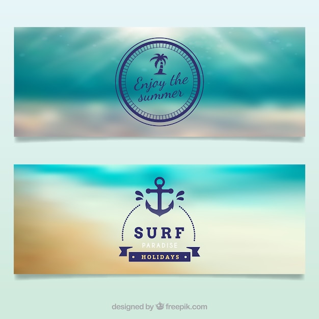 Beach banners of surf with blurred\
landscape