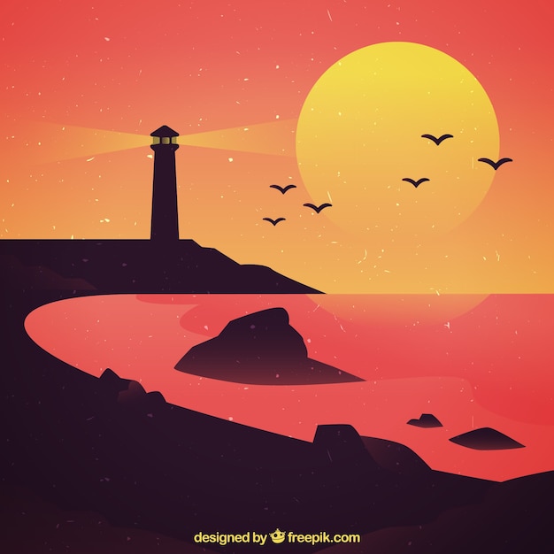 Beach landscape with lighthouse at
sunset