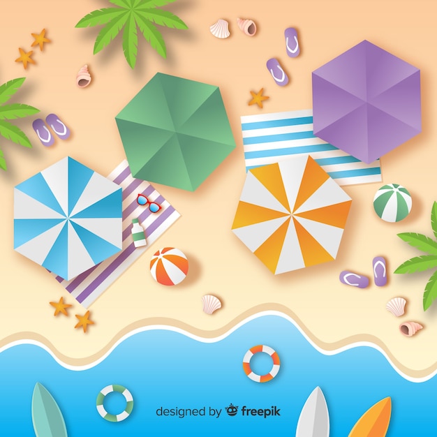 Beach top view in paper style Free Vector