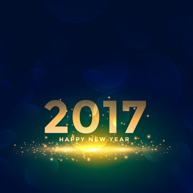 Beautiful new year 2017 background with\
sparkles effect