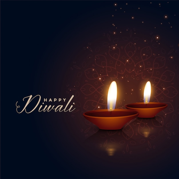 Beautiful two diwali festival diya on dark\
background