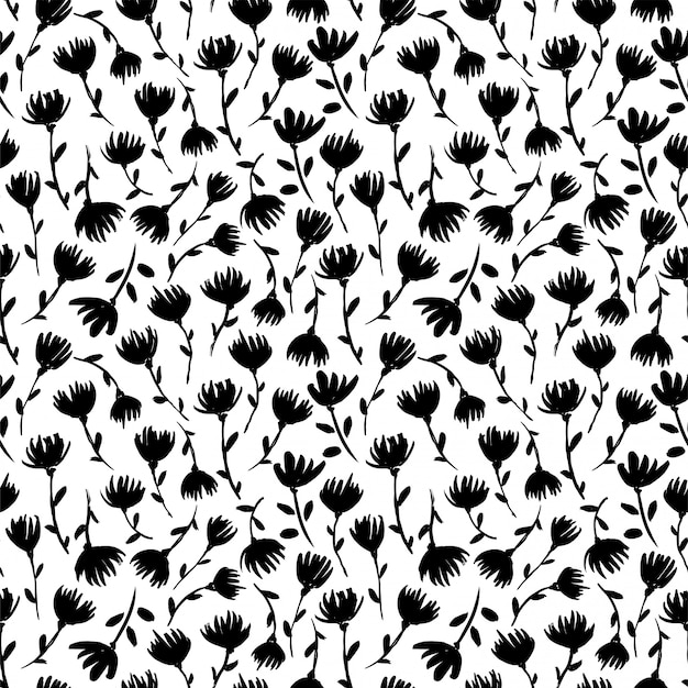 プレミアムベクター 黒と白の花のシームレスなパターン 繊細な野生の花のシルエットの手描きイラスト