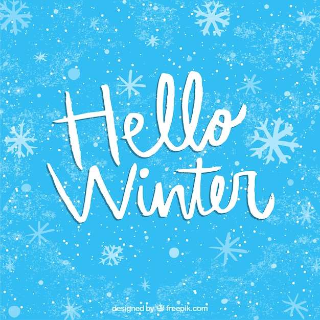 Blue background hello winter with lettering Vector | Free Download