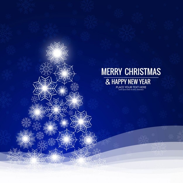 Free Vector | Blue background with shiny christmas tree