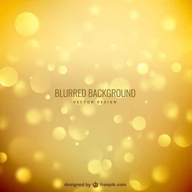Blurred background in golden tones Premium Vector Blurred background in golden tones Premium Vector