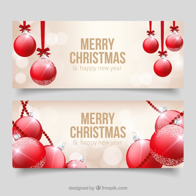 Bokeh banners with red christmas balls | Free Vector
