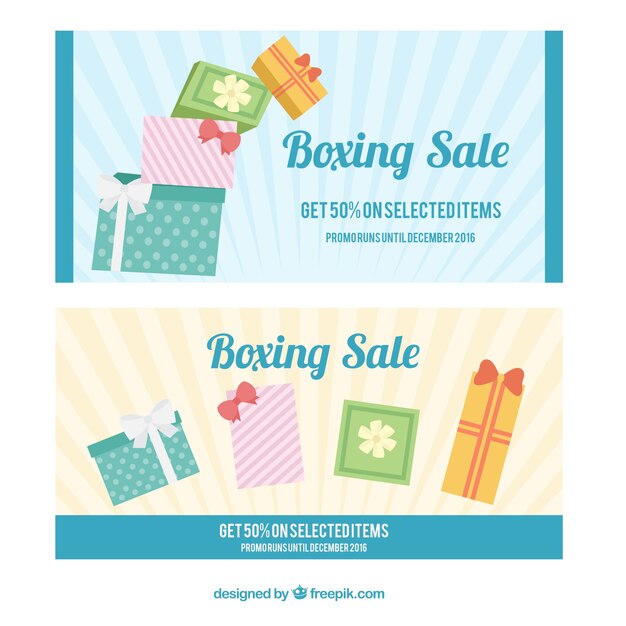 Boxing day banners with gift boxes in pastel\
colors