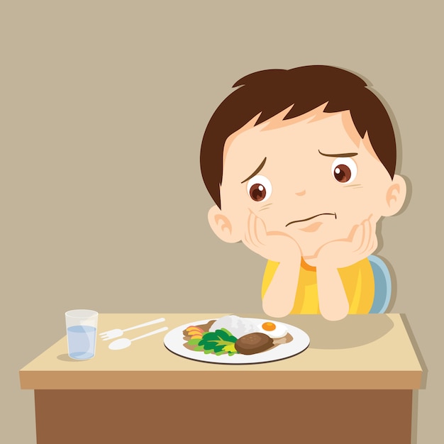 Boy bored with food Vector | Premium Download