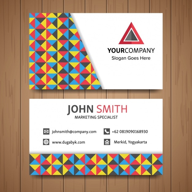 Free Vector | Business card with triangular geometric shapes