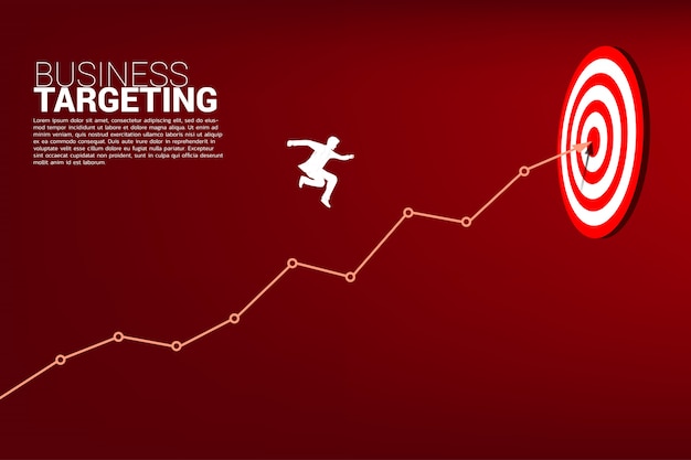 Businessman jumping on line graph to center of dartboard. Premium Vector