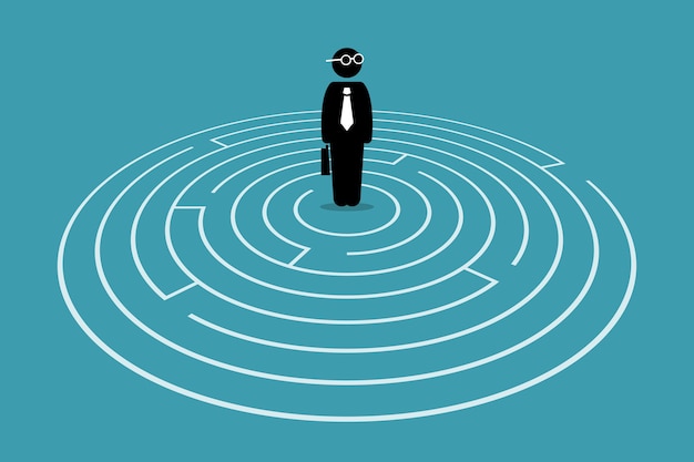 Businessman standing in the center of a maze. Premium Vector