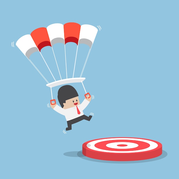 Premium Vector | Businessman with a parachute focus to landing on a target