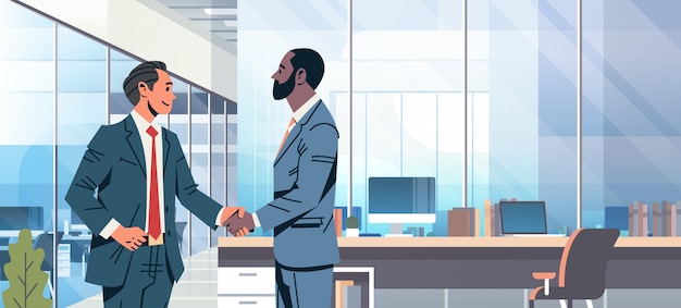 Businessmen handshake agreement banner Premium Vector
