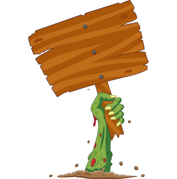 Premium Vector | Cartoon zombie hand out of the ground holding blank sign