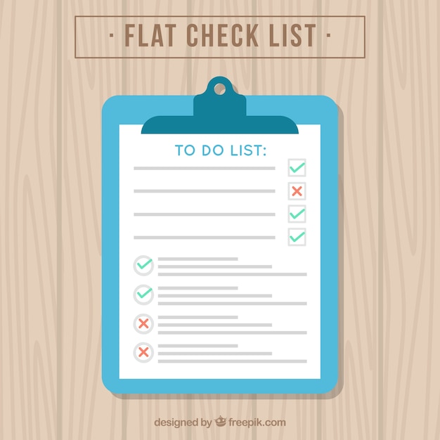 Free Vector | Checklist on a wooden table