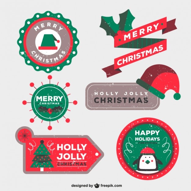 Christmas badges in stamped style Vector | Free Download