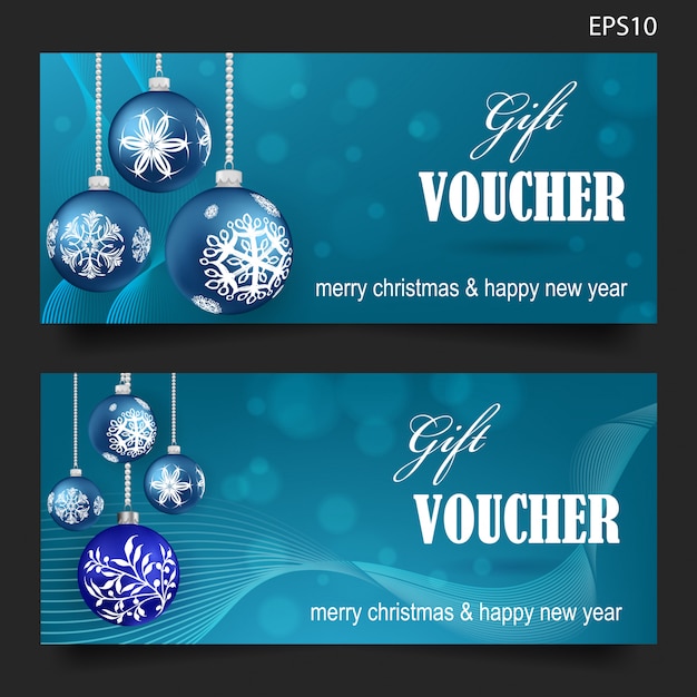 Premium Vector | Christmas gift voucher on blue background