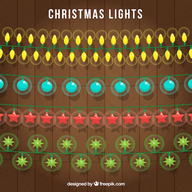 Download Christmas lights with different colors | Free Vector