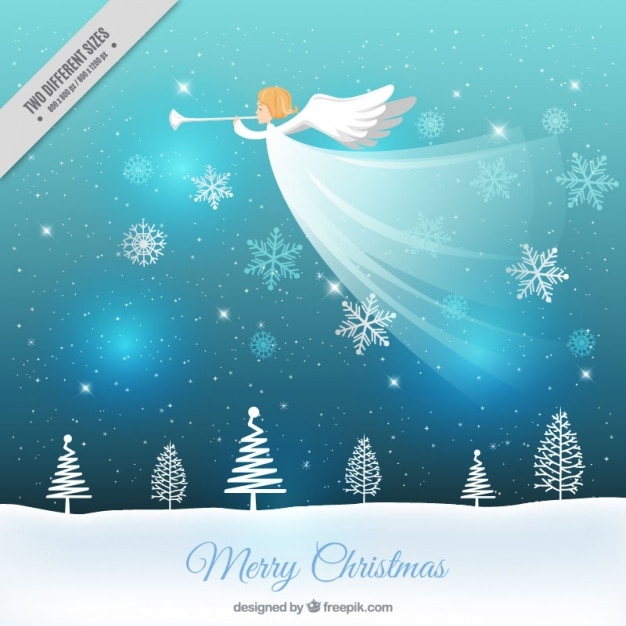 Christmas snowy landscape background and angel playing the trumpet