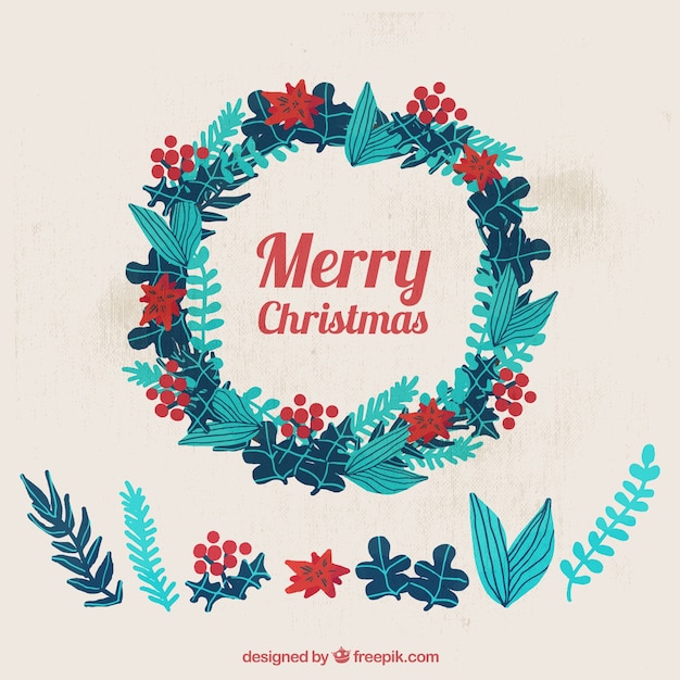 Free Vector | Christmas wreath made of flowers and hand-painted leaves