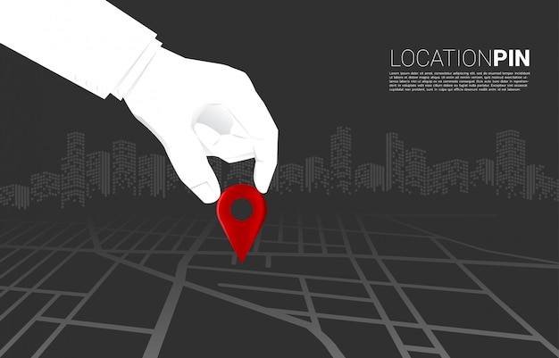 Close up hand of businessman place location pin marker on road map. concept of business set up, vision mission and goal Premium Vector