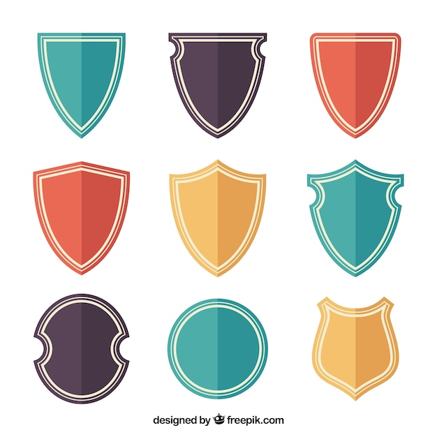 Free Vector | Collection of color shields in flat design