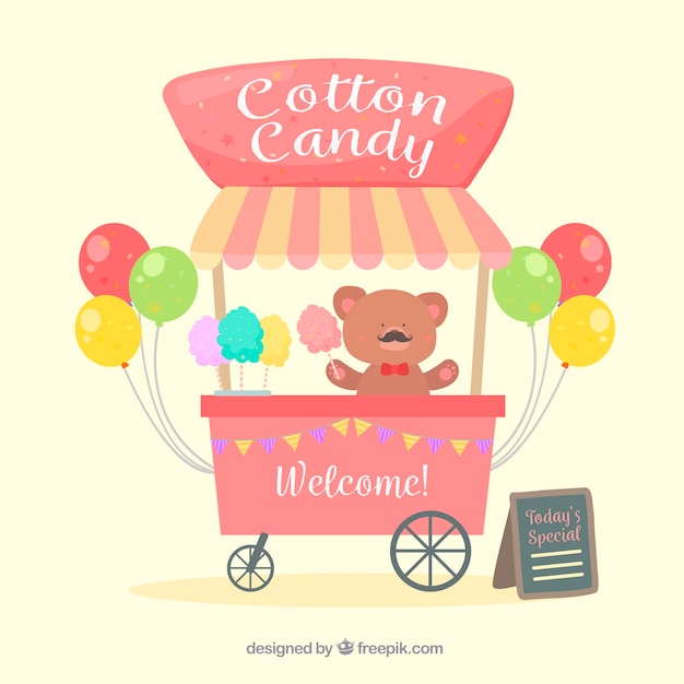 Cotton candy cart, teddy bear and balloons
