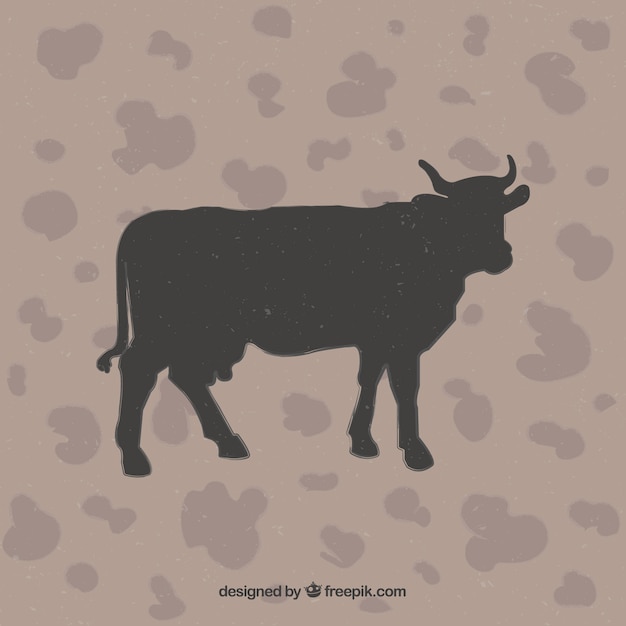 Download Cow silhouette on animal print background Vector | Free ...