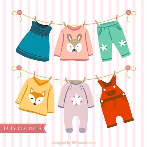 Download Cute baby clothes hanging on a rope Vector | Premium Download