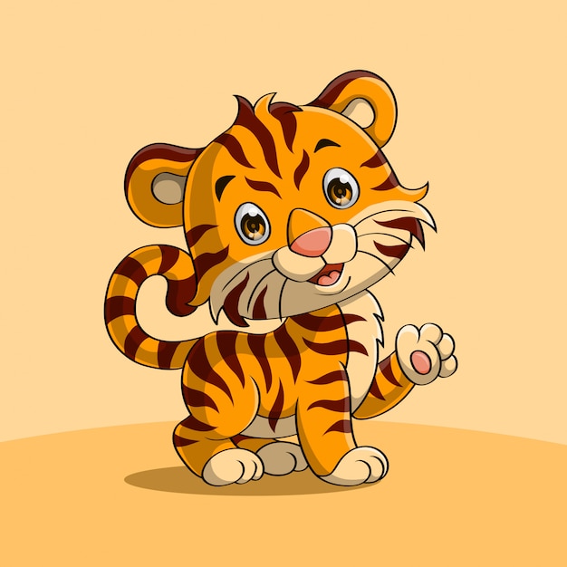 Download Cute baby tiger waving a hand | Premium Vector