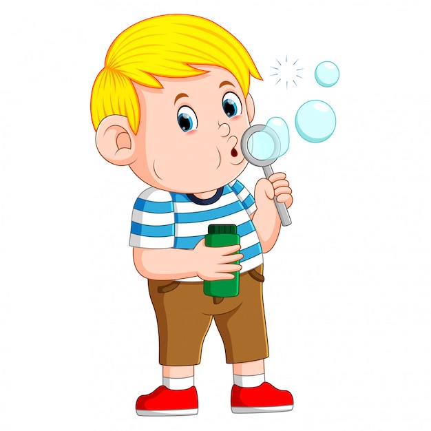 Download The cute boy is playing and blowing the bubble | Premium Vector