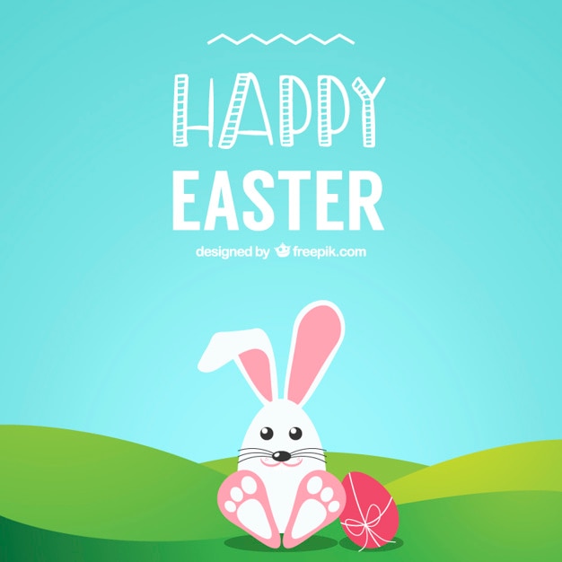 Download Cute easter bunny on the grass | Free Vector