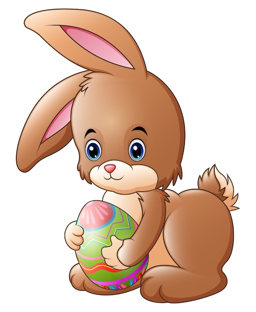 Download Premium Vector | Cute little bunny holding decorated ...