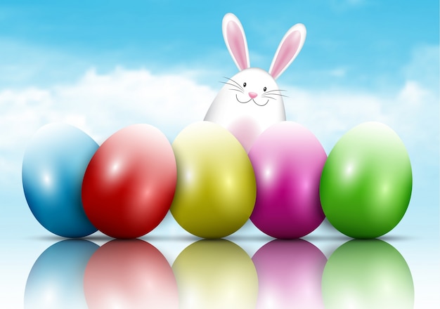 Easter bunny and eggs on a blue sky\
background