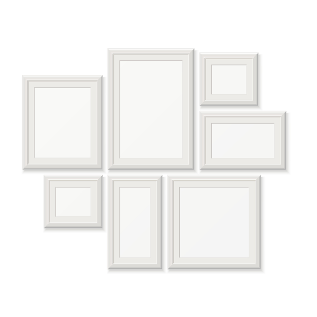 Empty white picture frames, 3d photo borders isolated on white wall. set of frames for photo Premium Vector