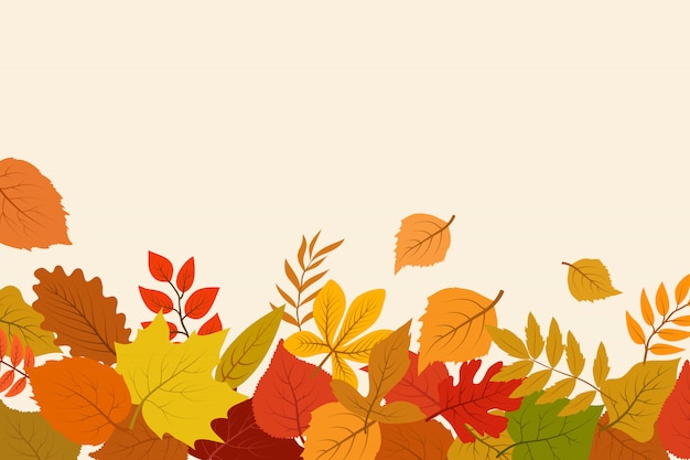 Premium Vector | Fallen gold and red autumn leaves background